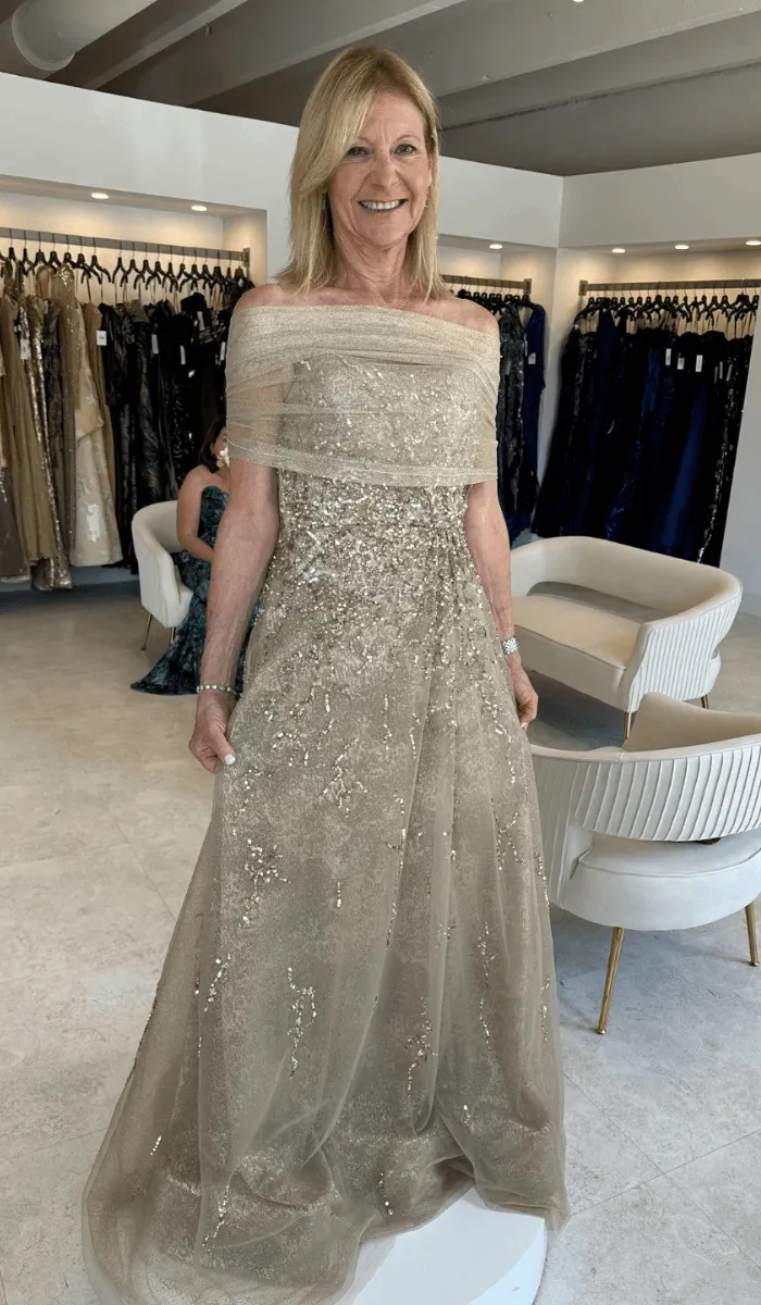 Evening gowns on the rail at the Rene Ruiz boutique