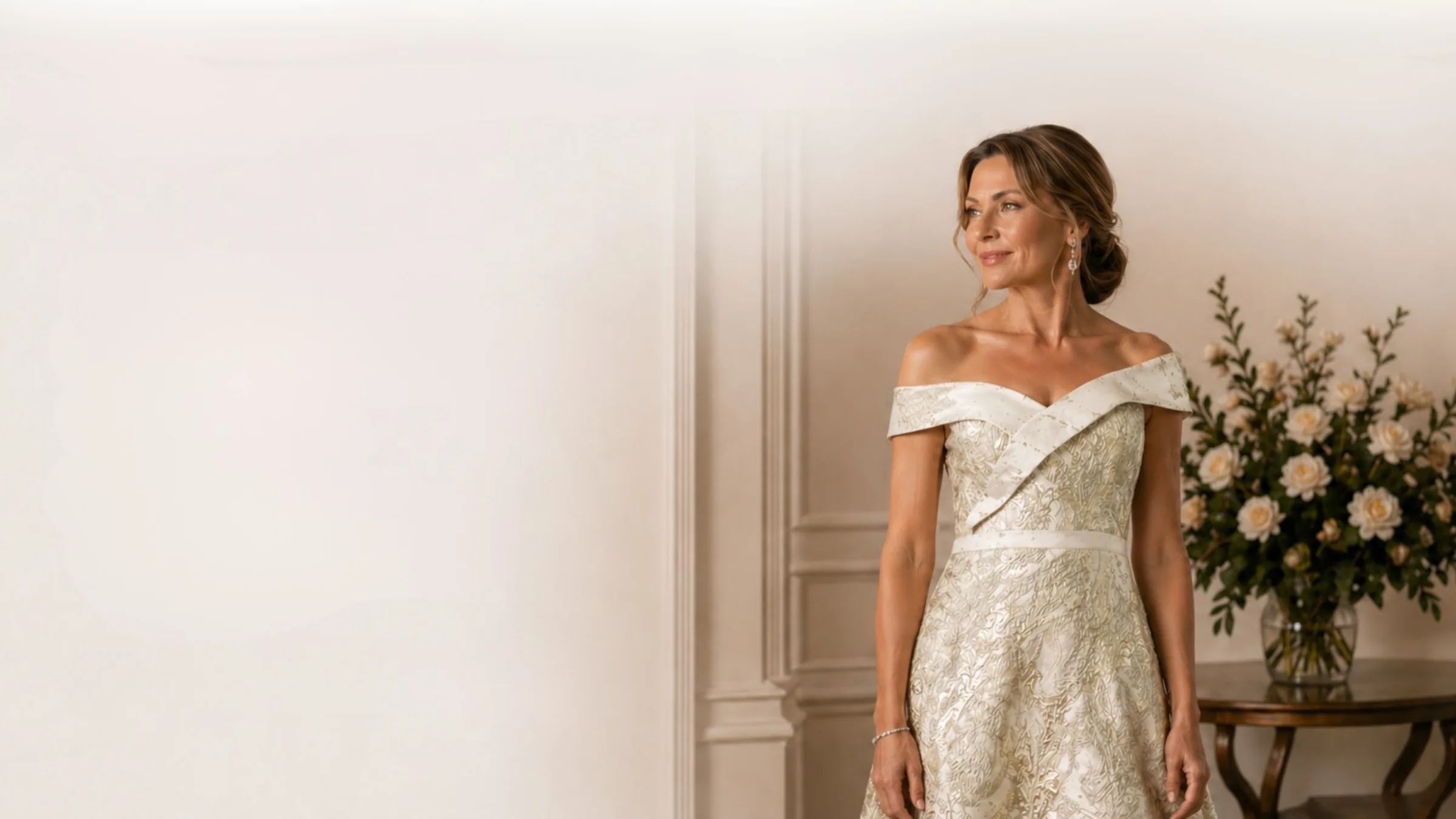 A client in a champagne brocade Rene Ruiz gown